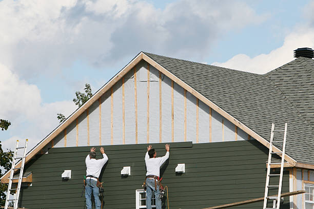 Professional Siding technician working in Allensville, PA
